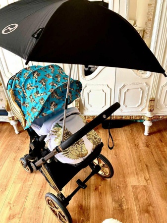 biały śpiworek do wózka złoty futro skrzydła queen baby