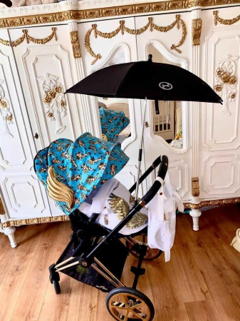 biały śpiworek do wózka złoty futro skrzydła queen baby